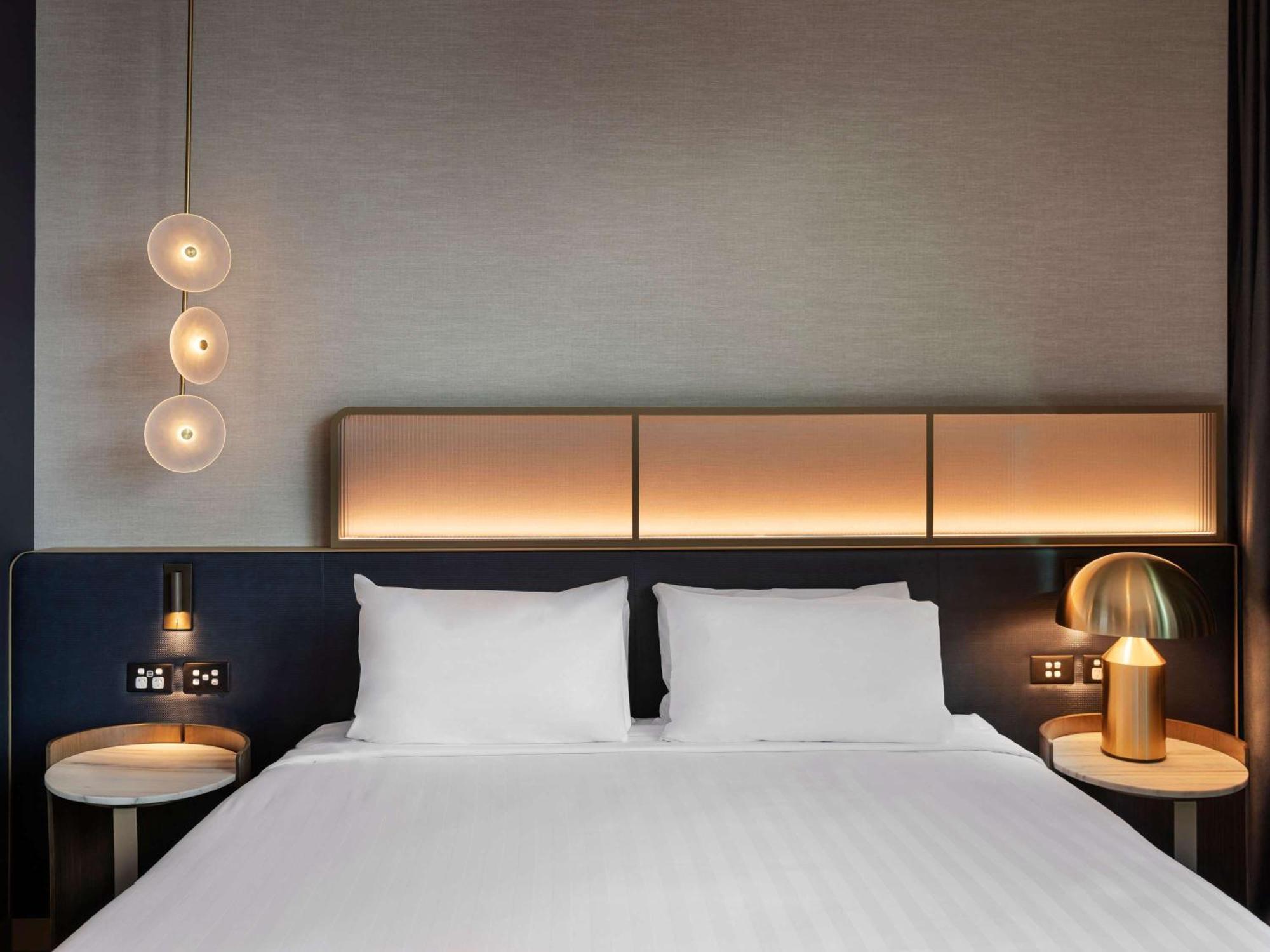 Hotel Pullman Auckland Airport Extérieur photo A bedroom at the hotel